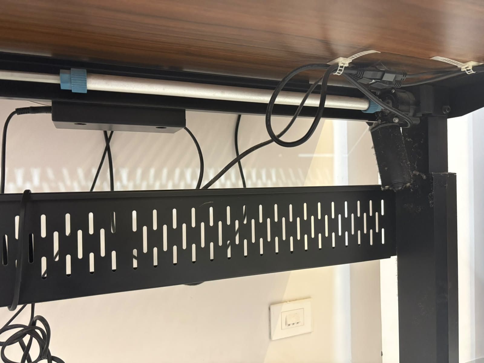 Height-adjustable desk — cable tray